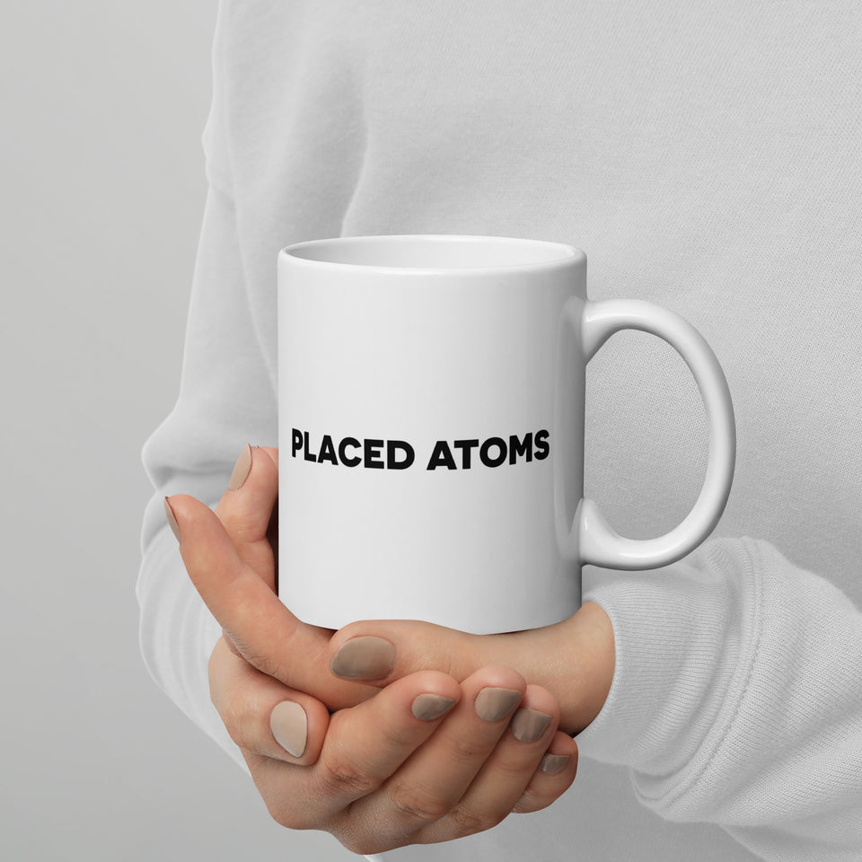 ATOMS PLACED on white glossy mug